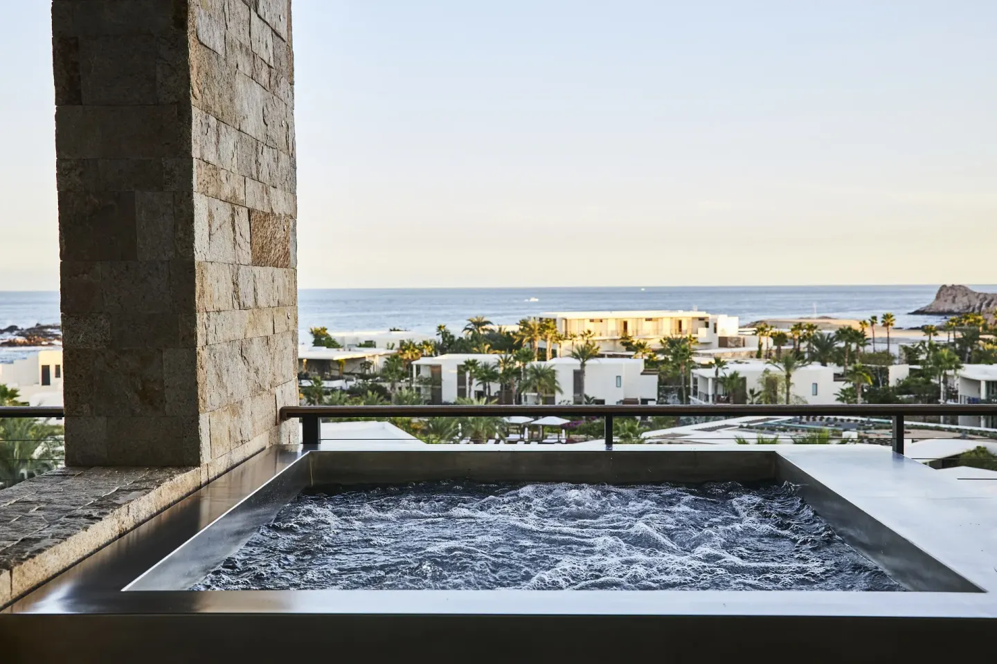 Balcony plunge pool with ocean and resort views at Chileno Bay Resort & Residences.