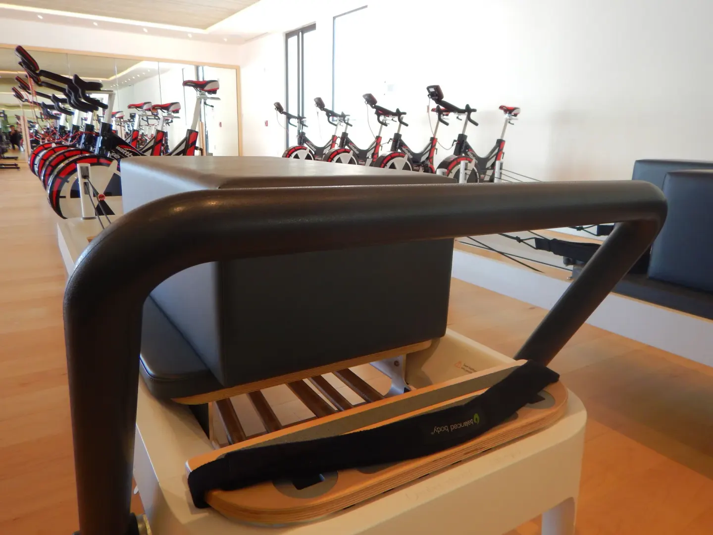 Pilates reformer and indoor cycling bikes in the fitness studio at Chileno Bay Resort & Residences.