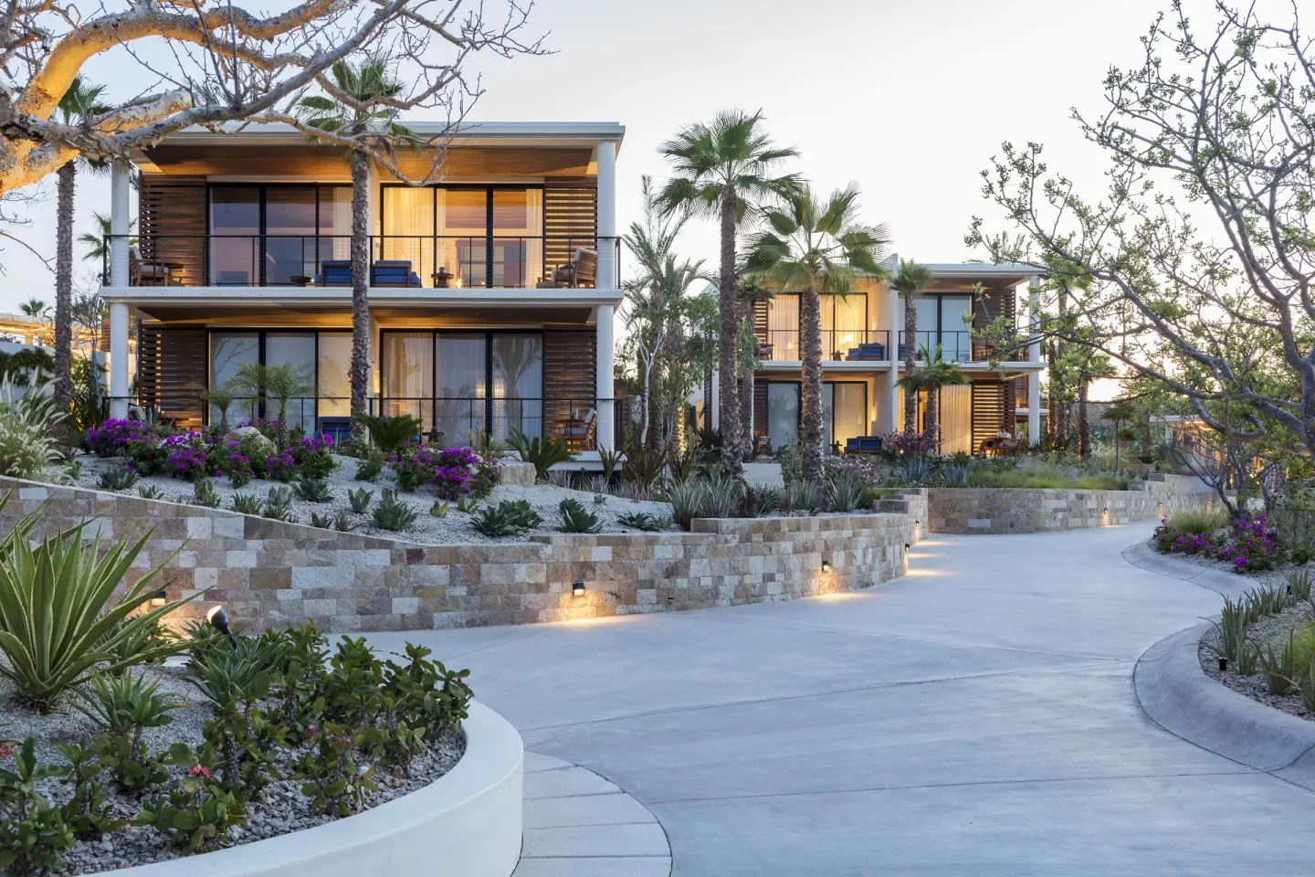 Residence buildings and landscaped drive at Chileno Bay Resort & Residences.