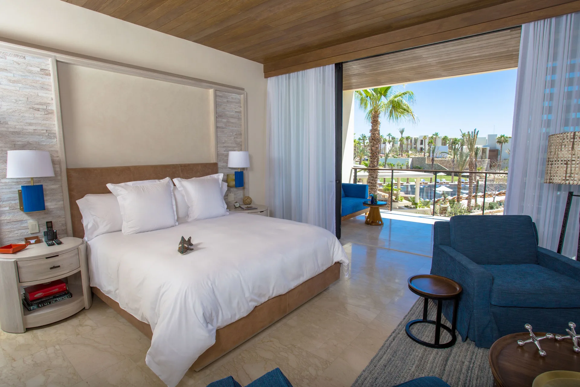Garden View room with king bed and balcony at Chileno Bay Resort & Residences.