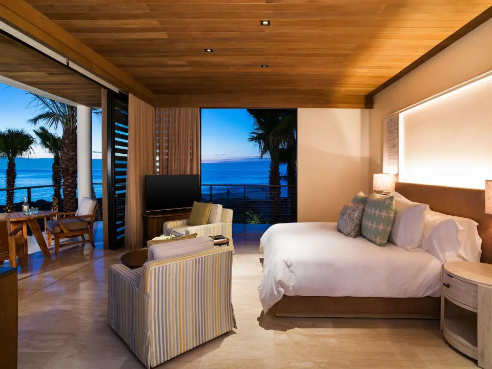 Oceanfront king guest room with terrace and sea view at Chileno Bay Resort & Residences.