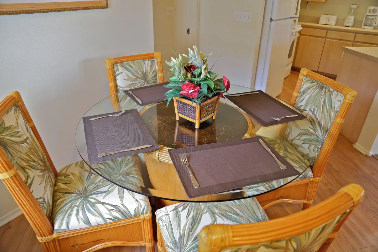 Round glass dining table set for four at Club Wyndham Bali Hai Villas.