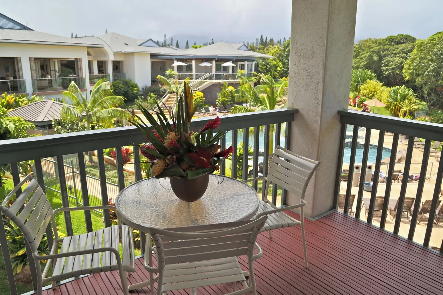 Furnished balcony overlooking the pool area at Club Wyndham Bali Hai Villas.