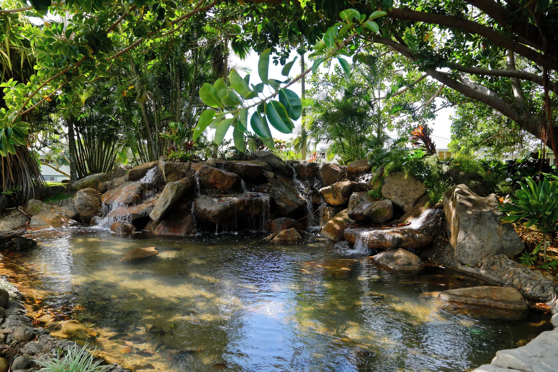 Rock waterfall and pond in the gardens at Club Wyndham Bali Hai Villas.