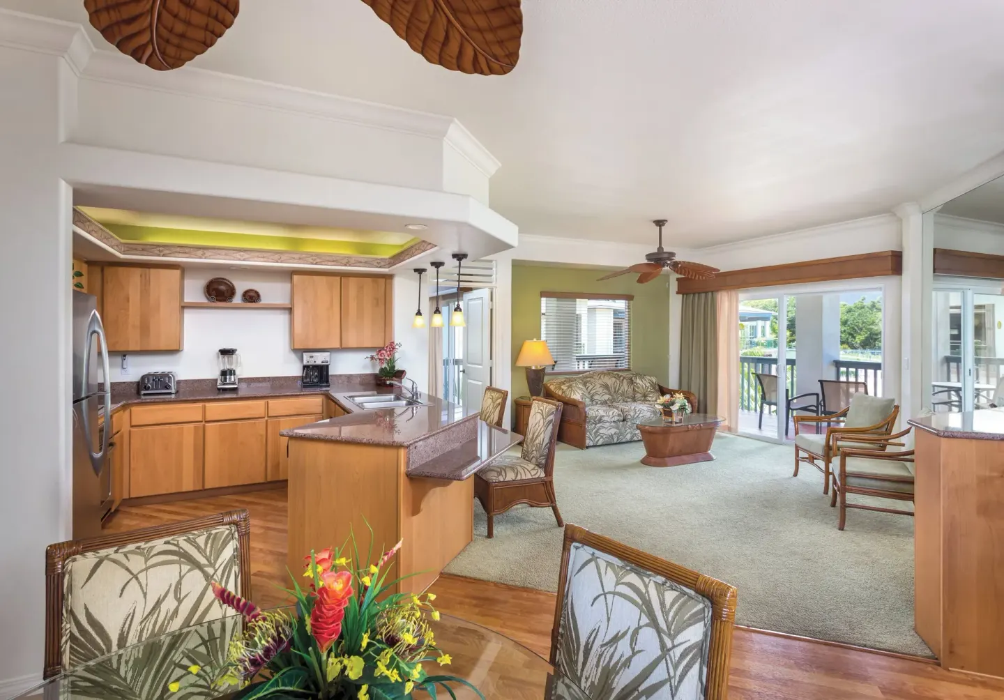 Open villa kitchen, dining, and living area at Club Wyndham Bali Hai Villas.