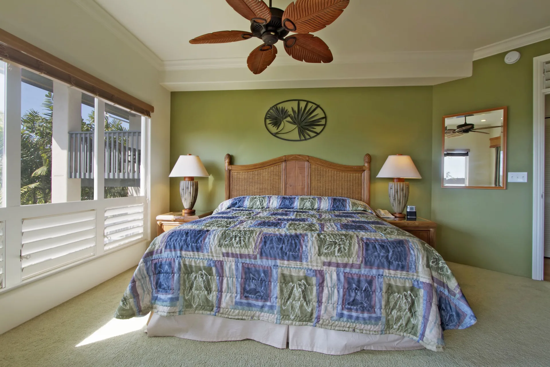 Two-bedroom suite king bedroom with wide windows at Club Wyndham Bali Hai Villas.