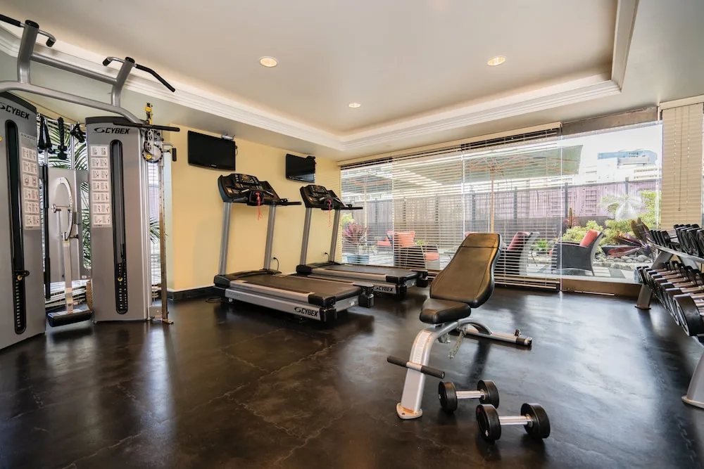 Fitness room with treadmills and weights at Club Wyndham Royal Garden at Waikiki.