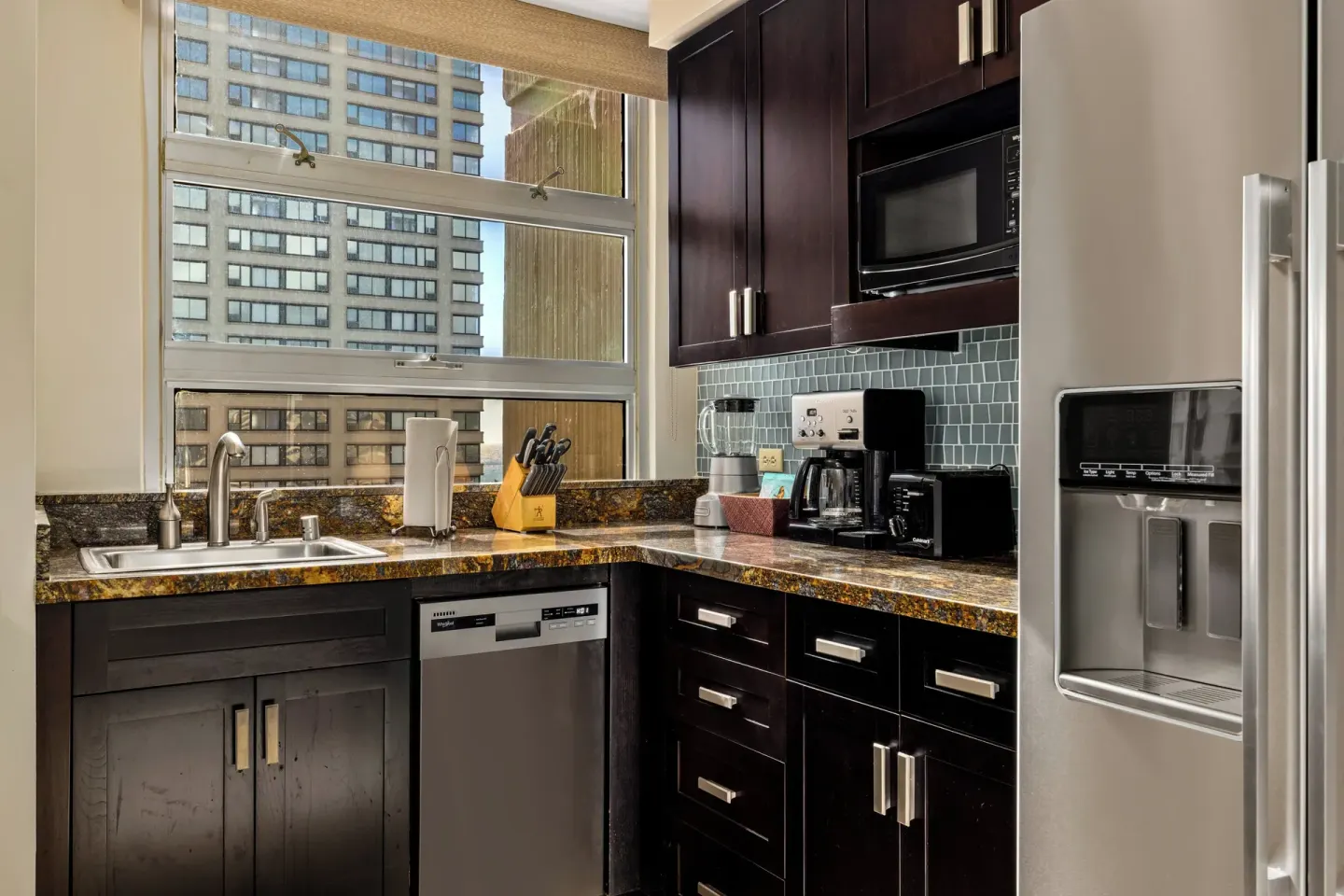 Guest room kitchen with window at Club Wyndham Royal Garden at Waikiki.