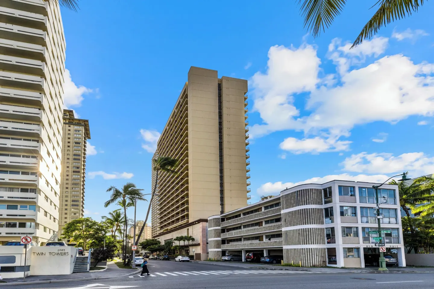 Street corner view of high-rise buildings near Club Wyndham Royal Garden at Waikiki.