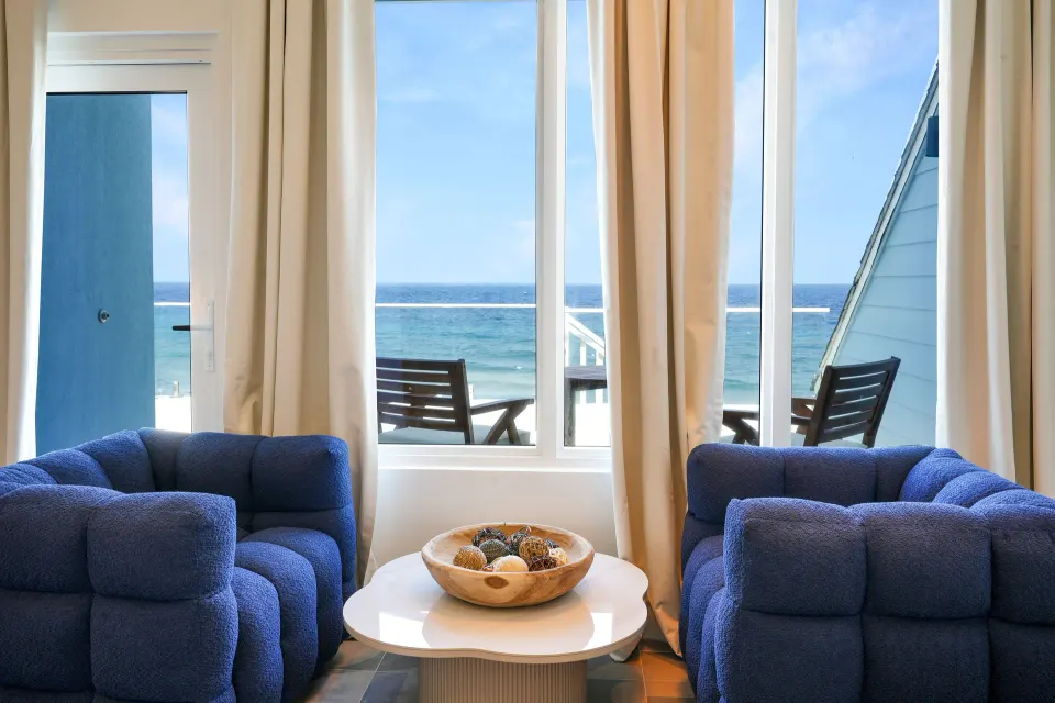 Ocean View room sitting area facing the sea at Cobalt Coast Resort.