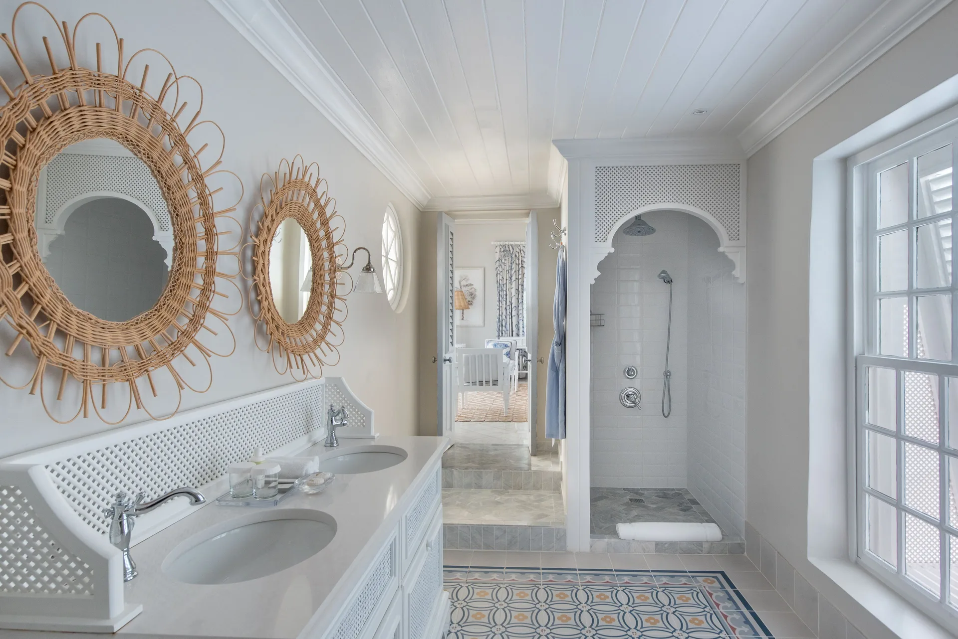 Camelot at the Great House Room bathroom at Cobblers Cove featuring double vanity, walk-in shower, and refined plantation-style design in Barbados.