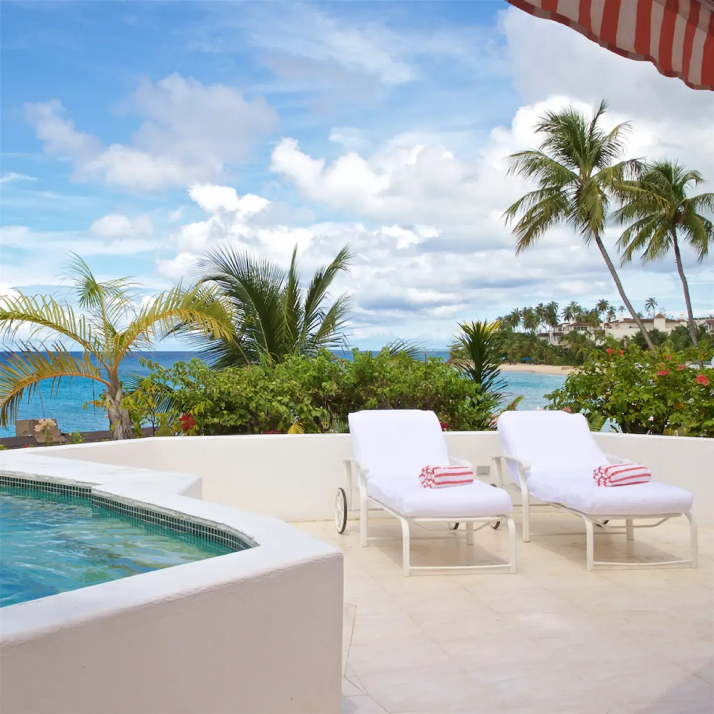 Colleton at the Great House terrace with plunge pool and ocean-view loungers at Cobblers Cove.