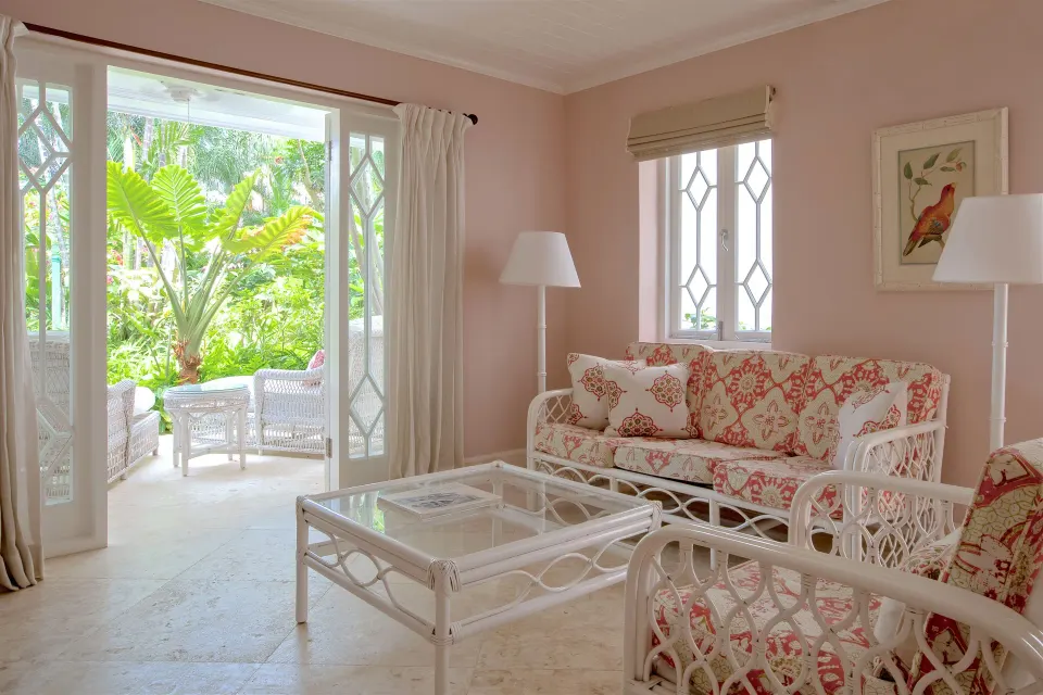 Upper Circle Suite sitting room opening to a garden terrace at Cobblers Cove.