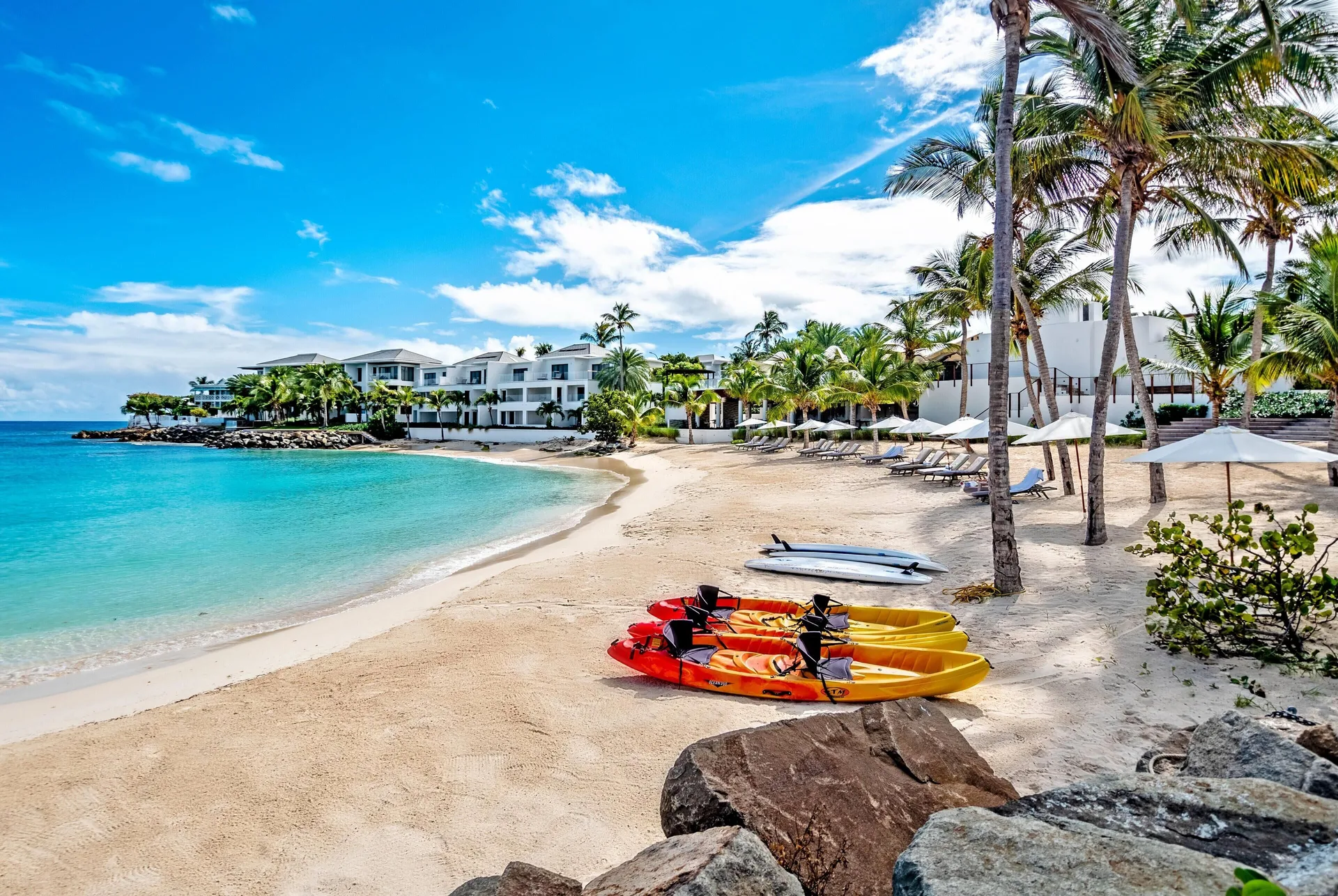 Hodges Bay Resort and Spa luxury resort with residences and modern beachfront Caribbean style