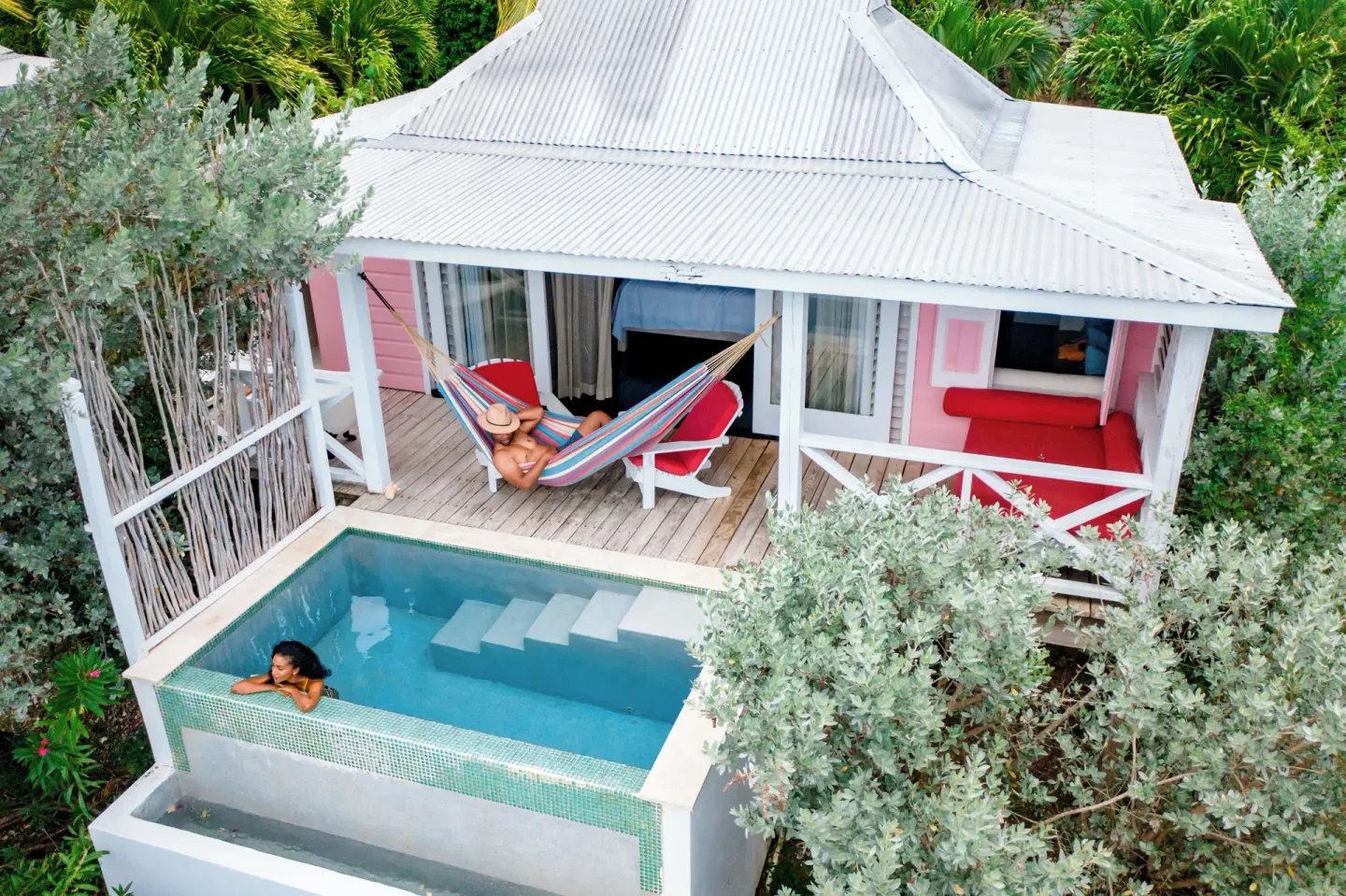 Starfish Azure Waterfront Pool Suite cottage with hammock, veranda, and private pool at Cocobay Resort.