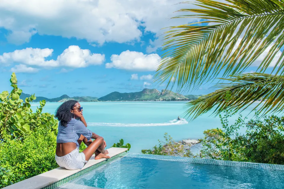 Panoramic Suite infinity-edge private pool overlooking the bay at Cocobay Resort.