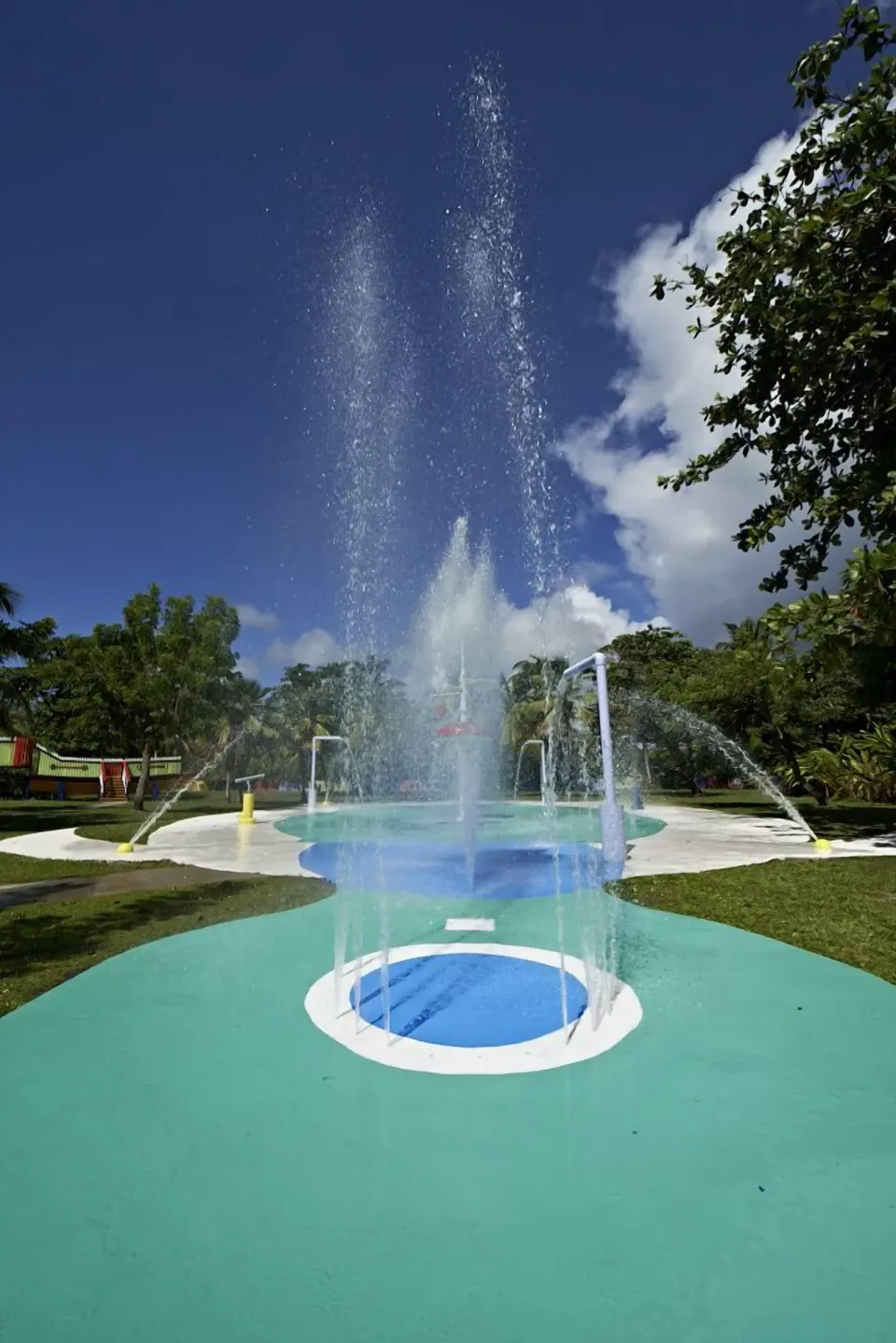 Splash pad with tall water jets at Coconut Bay Beach Resort & Spa.