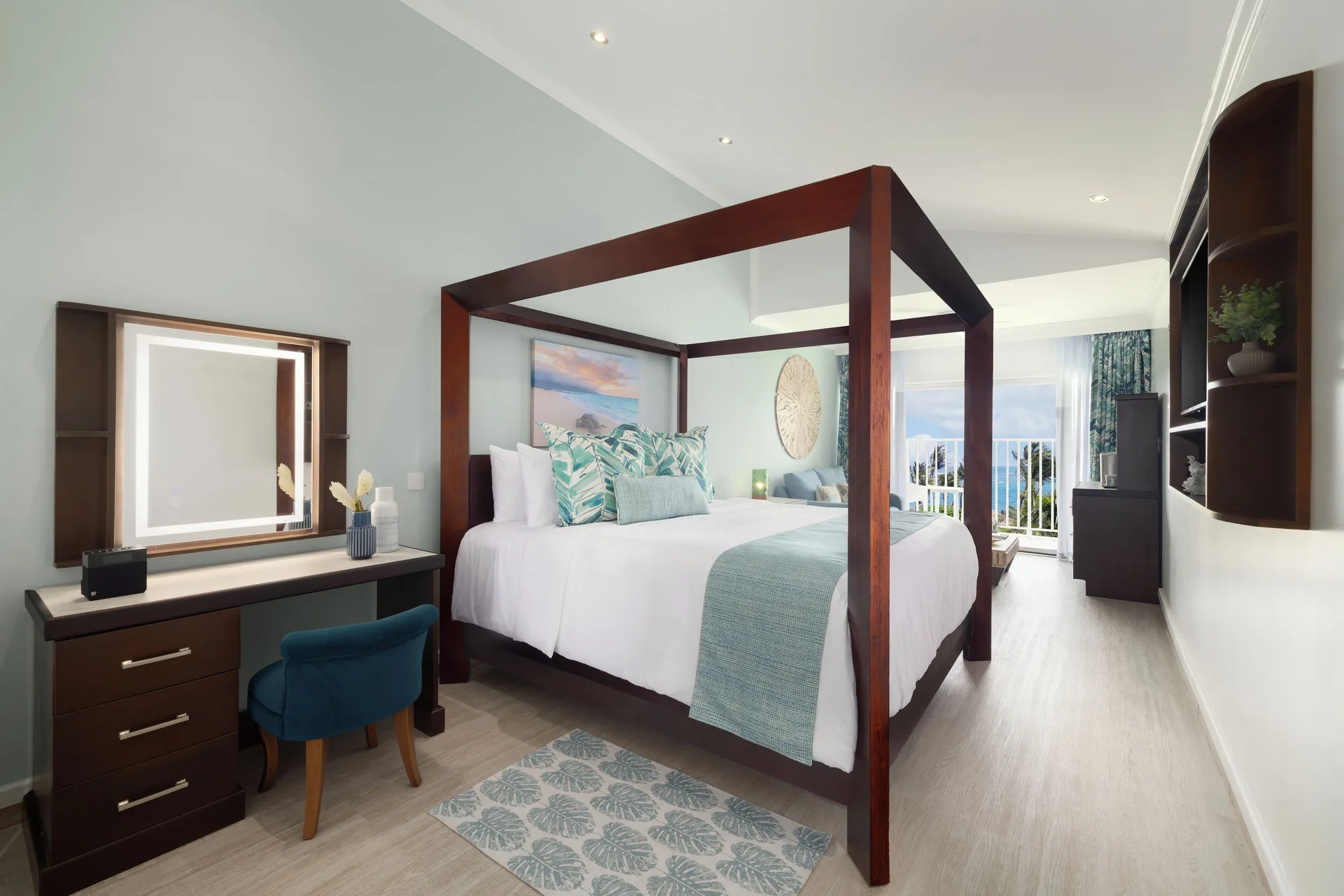 Harmony Concierge Junior Suite Club Level Ocean View at Coconut Bay Beach Resort & Spa with king bed, vanity area, and premium ocean-facing design in St. Lucia.