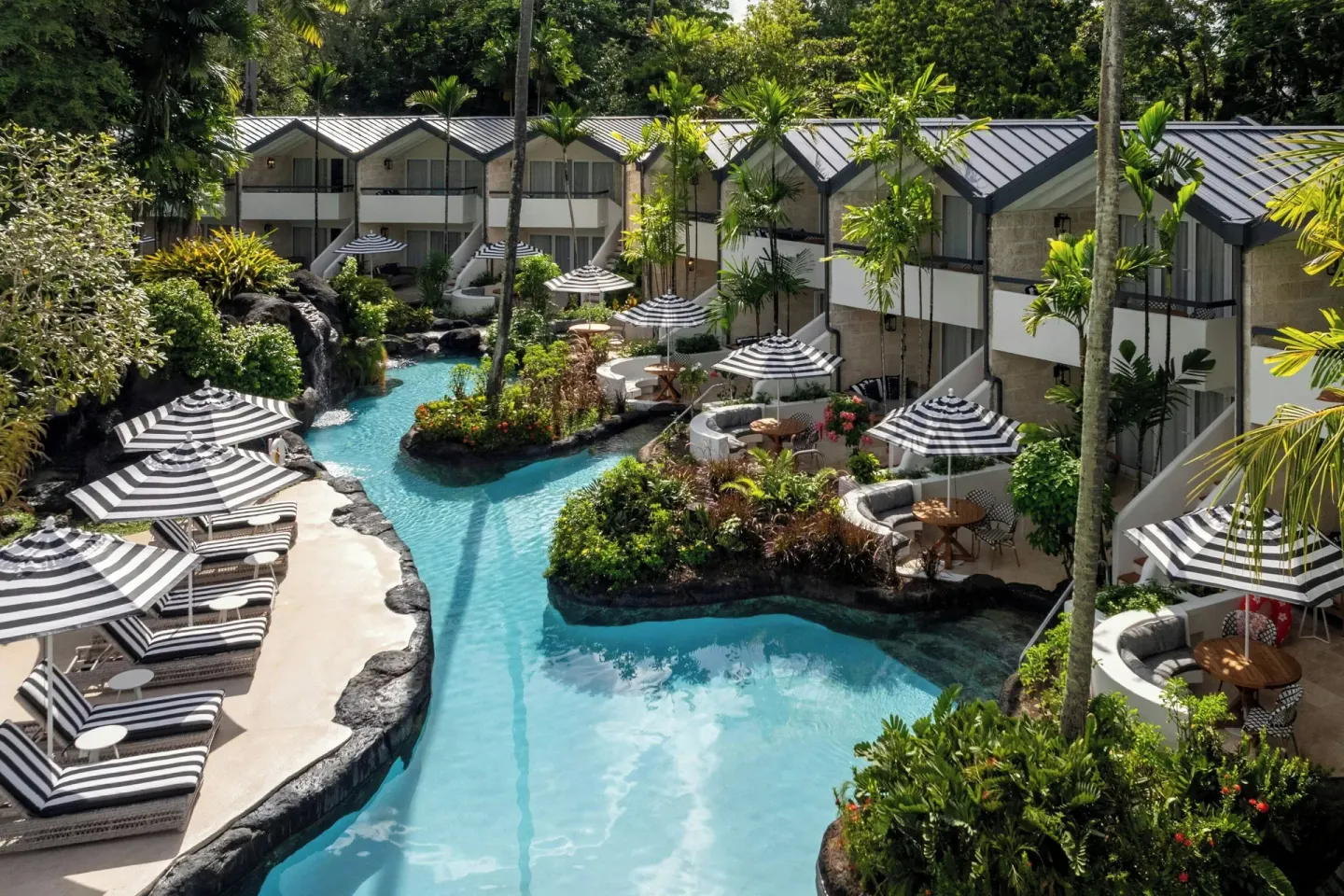 Garden-view rooms, balconies and lagoon-style pool at Colony Club, Barbados.