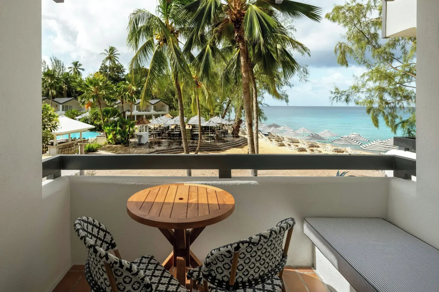 Balcony seating with beach and ocean view at Colony Club, Barbados.