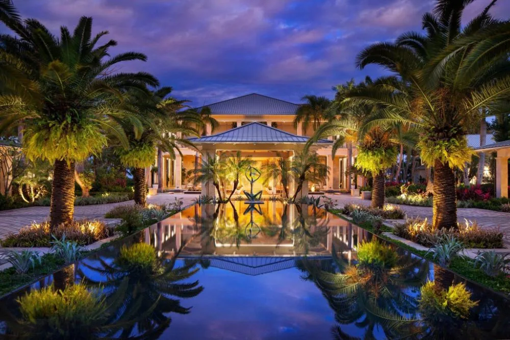 Bahia Beach Resort, Puerto Rico luxury coastal resort community with beach, greenery, and refined low-rise residences near Río Grande, Puerto Rico.