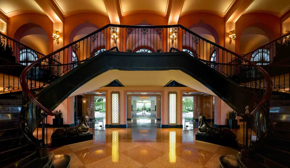 Grand double staircase in the lobby of Condado Vanderbilt Hotel.