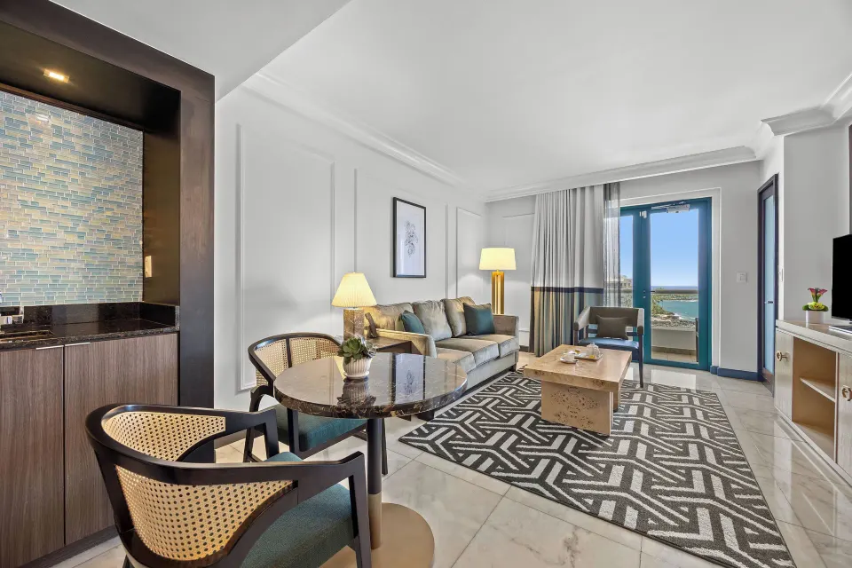 Living room of the Biltmore Ocean View One-Bedroom Suite at Condado Vanderbilt Hotel.