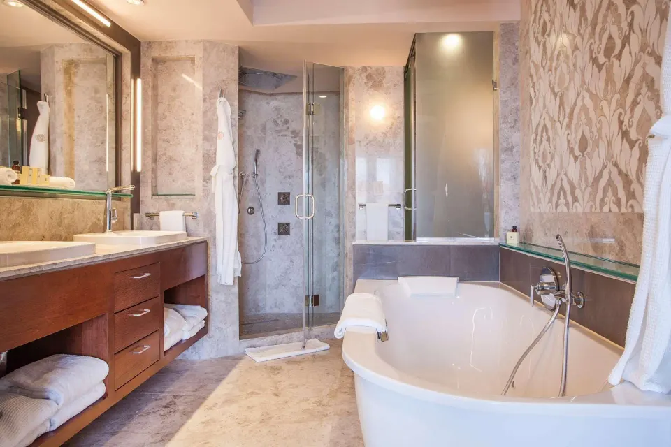 Marble bathroom in the Vanderbilt Oceanfront Two-Bedroom Suite at Condado Vanderbilt Hotel.