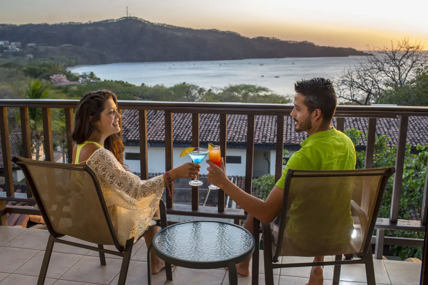 Villa Platinum Ocean View balcony seating with bay view at Condovac la Costa.