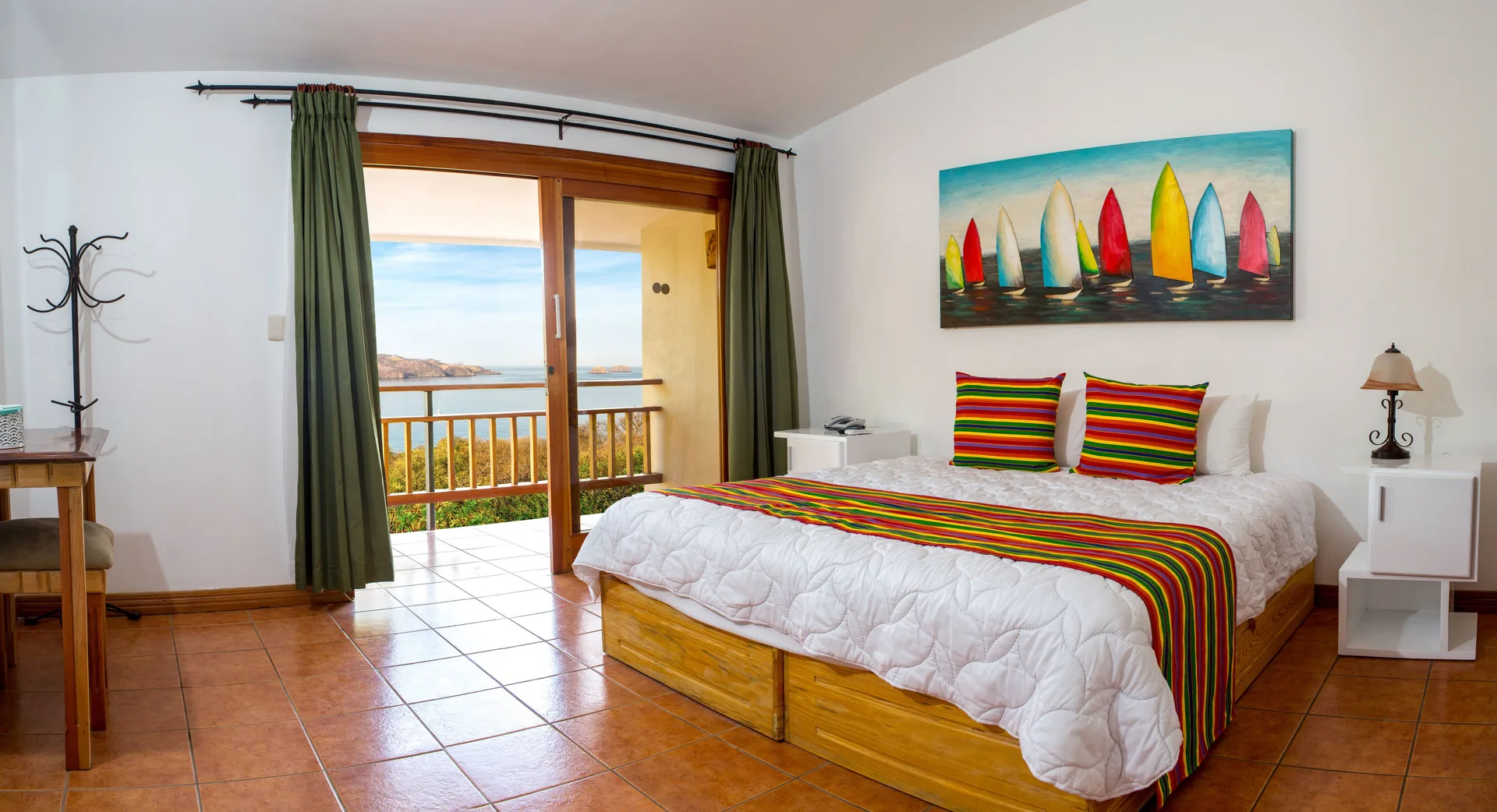 Platinum Villa at Condovac la Costa with king bed, private balcony, and stunning Pacific Ocean views in Guanacaste, Costa Rica.
