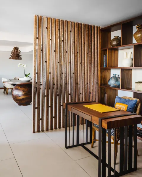 Penthouse desk nook and wood screen at Conrad Punta de Mita.