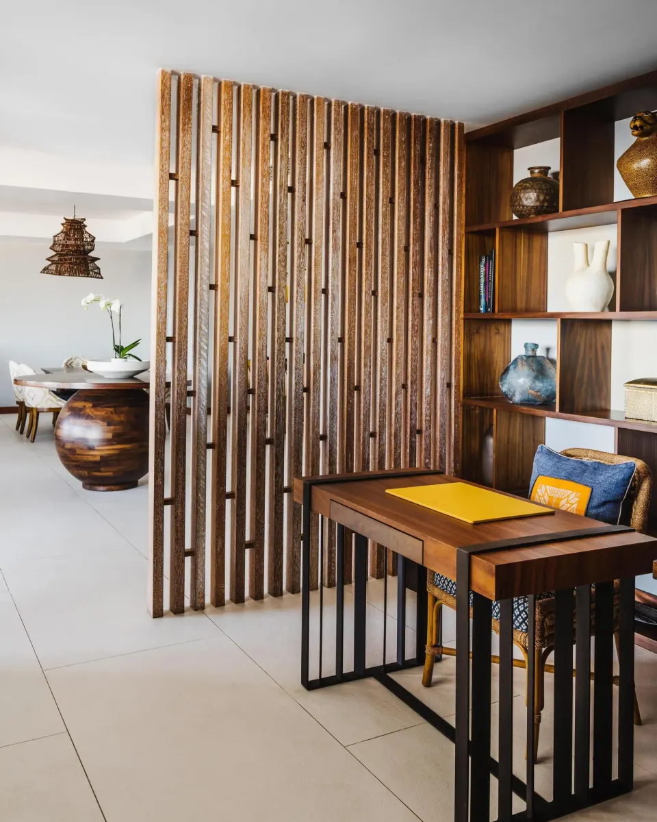 Penthouse desk nook and wood screen at Conrad Punta de Mita.