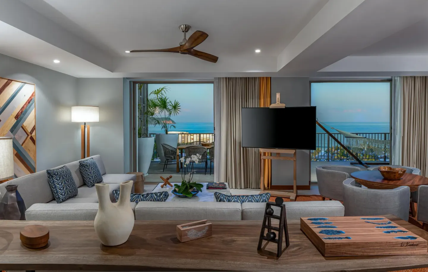 Penthouse living area with ocean-view balconies at Conrad Punta de Mita.