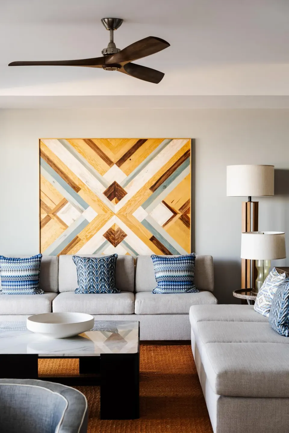Penthouse living room sofa and artwork at Conrad Punta de Mita.