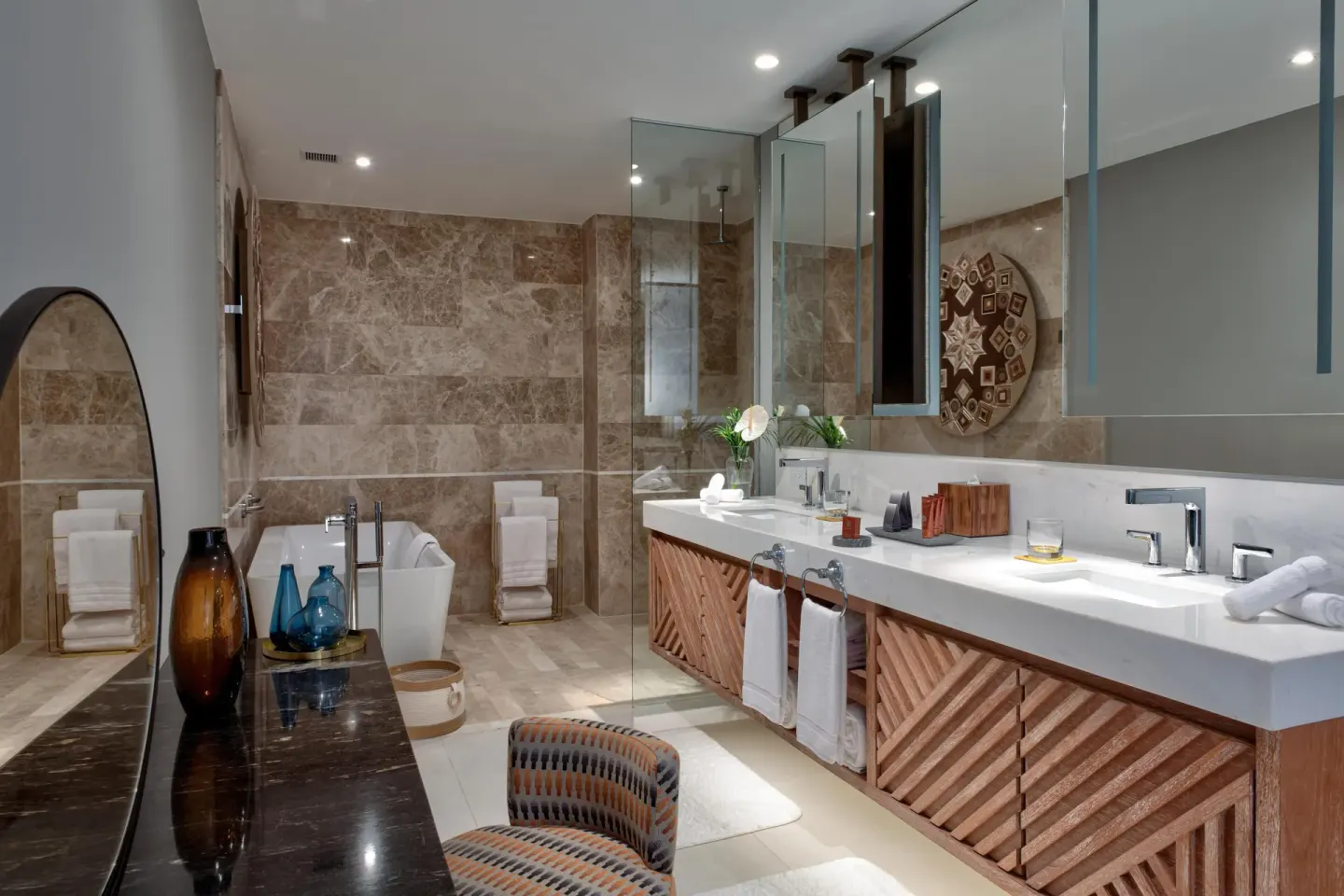 Penthouse bathroom with double vanity and soaking tub at Conrad Punta de Mita.