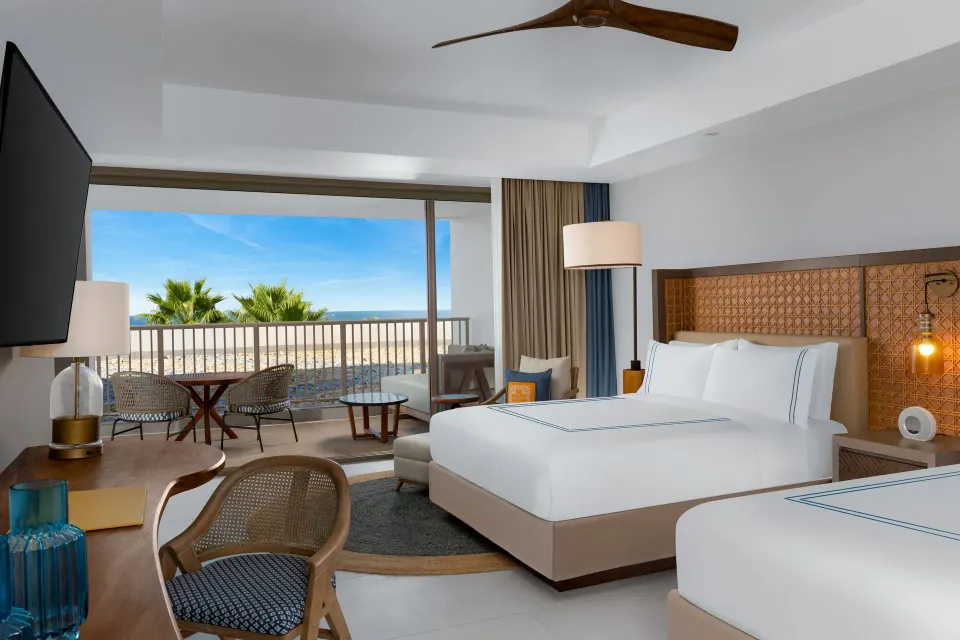 Ocean View room with two beds, balcony seating and sea view at Conrad Punta de Mita.