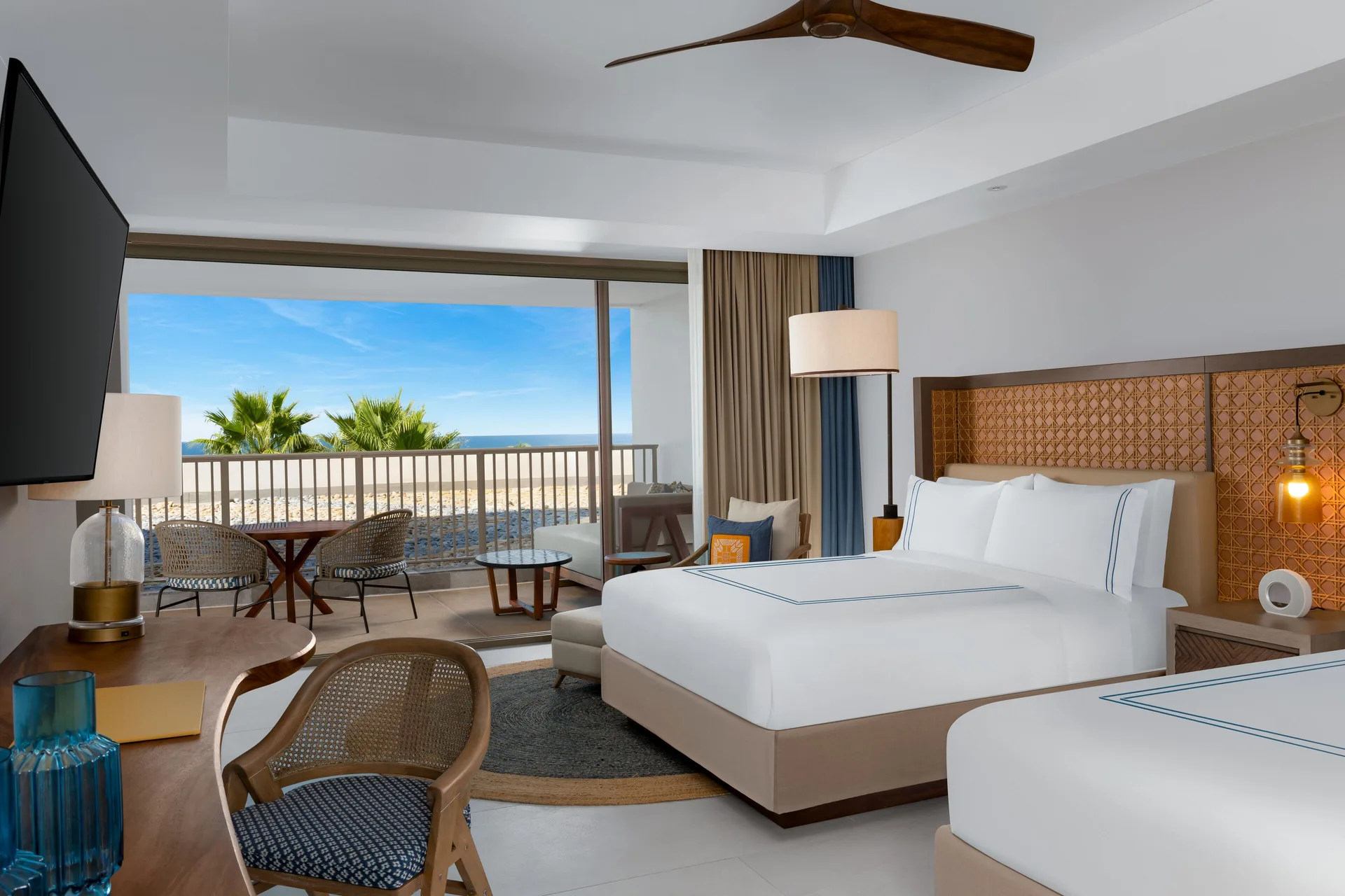 Ocean View room with two beds, balcony seating and sea view at Conrad Punta de Mita.