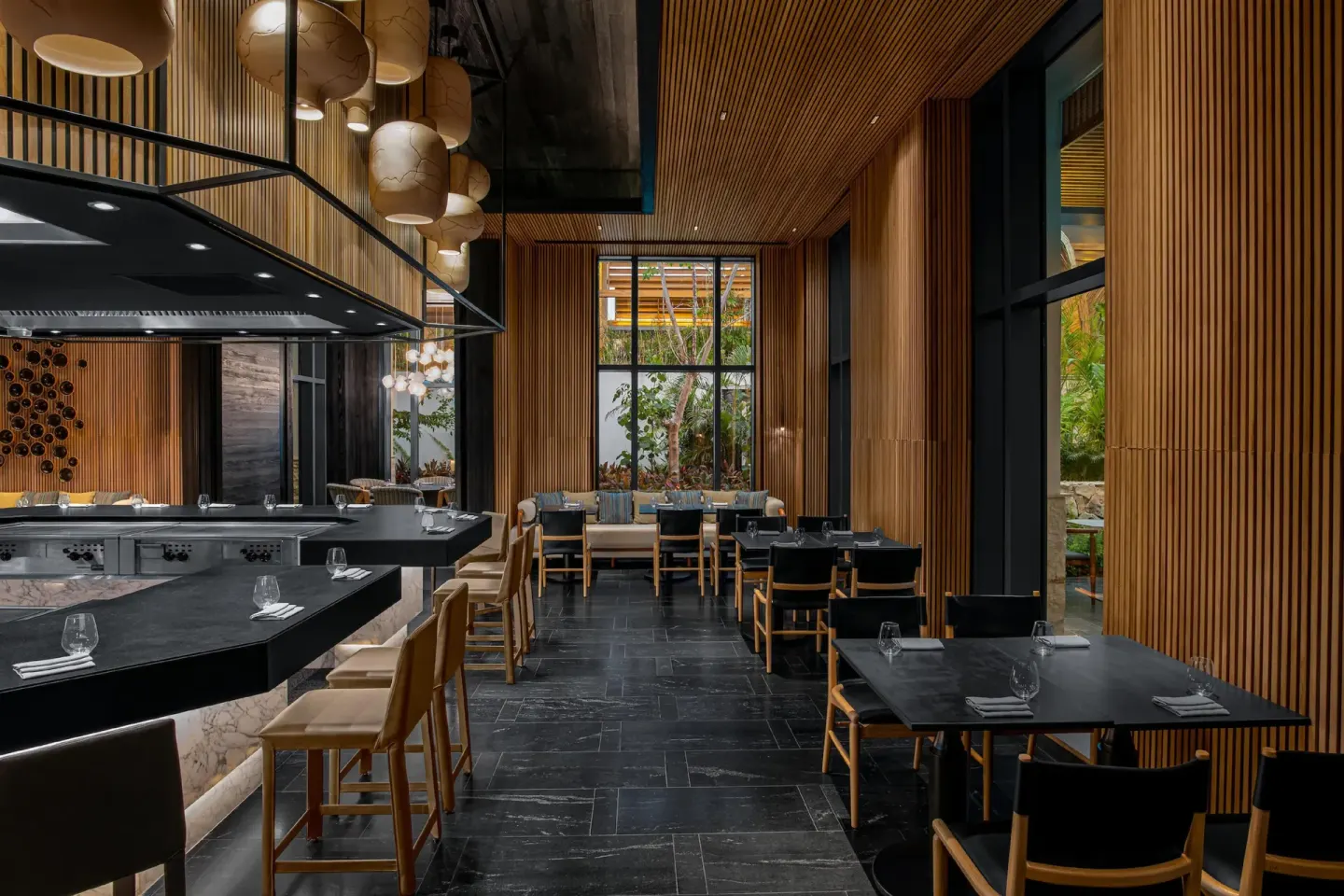 Japanese-style dining room with teppanyaki counter at Conrad Tulum Riviera Maya.