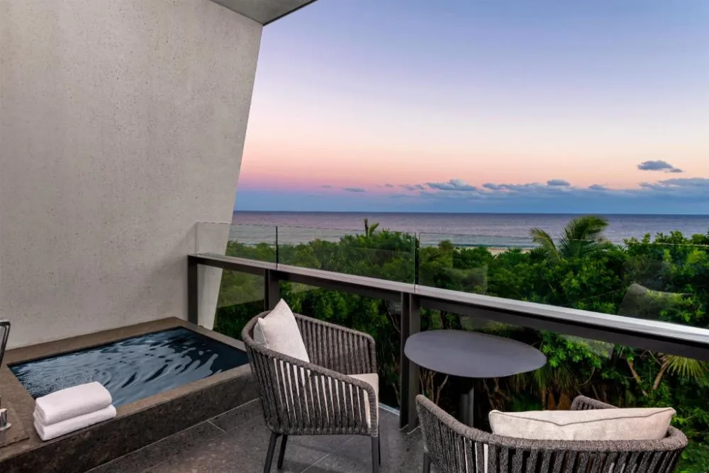 Ceiba Presidential Suite balcony with plunge pool and ocean view at Conrad Tulum Riviera Maya.