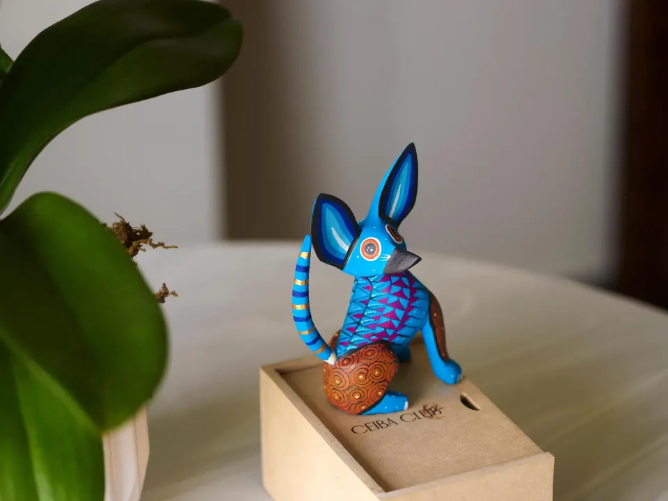 Colorful animal figurine on a Ceiba Club card at Conrad Tulum Riviera Maya