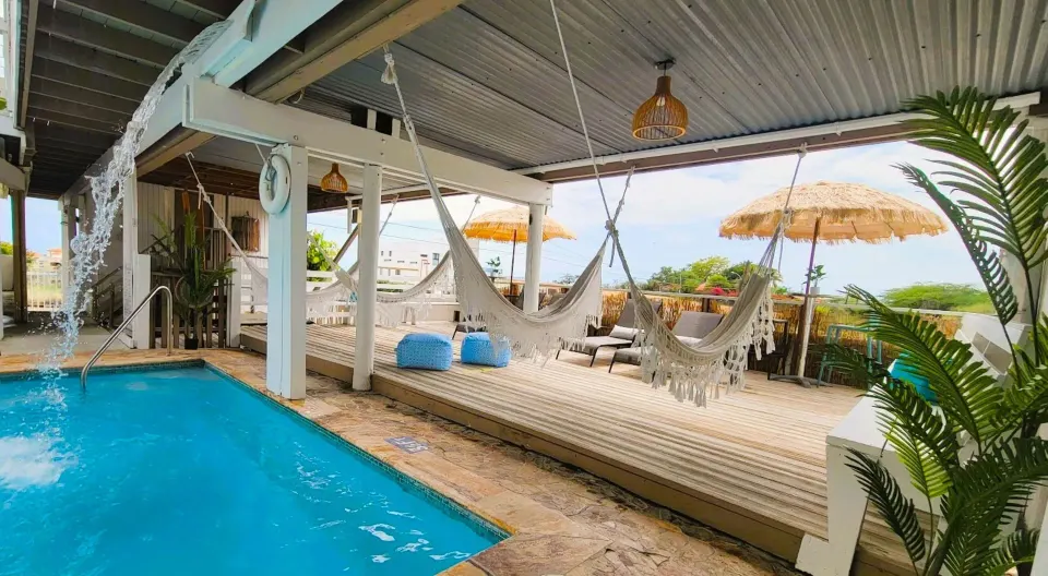 La Jamaca colorful boutique inn-style hotel with bright tropical decor and pool area in La Parguera, Puerto Rico.
