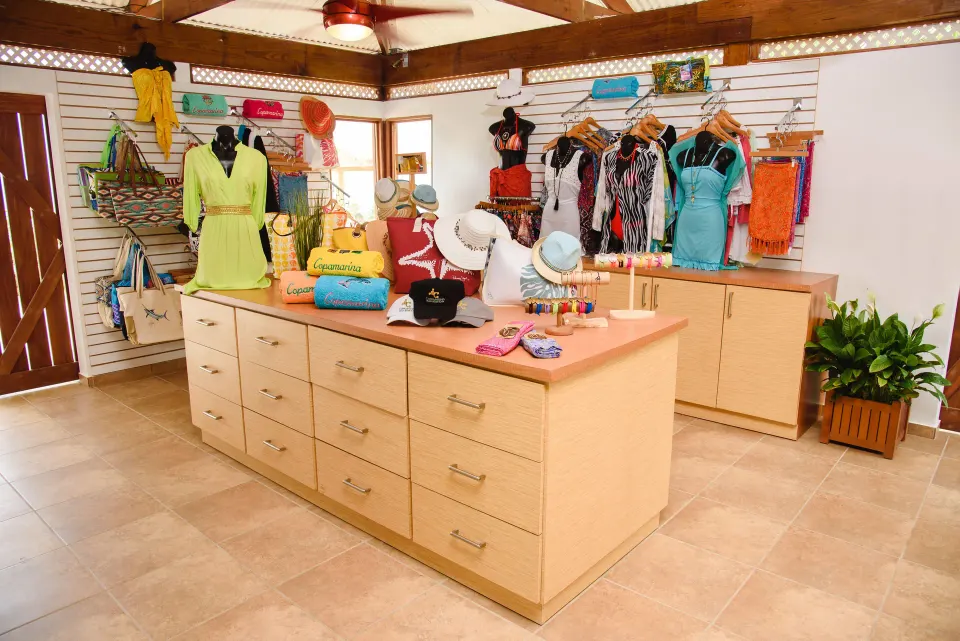 Resort shop with clothing, hats, and beach items at Copamarina Beach Resort & Spa.