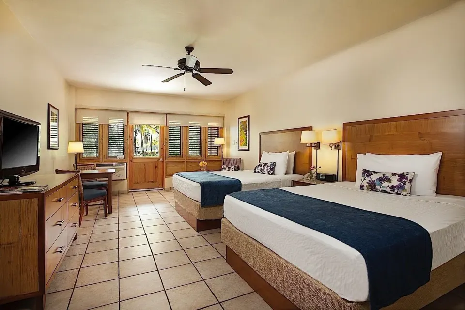 Deluxe Garden View Room with two beds at Copamarina Beach Resort & Spa.