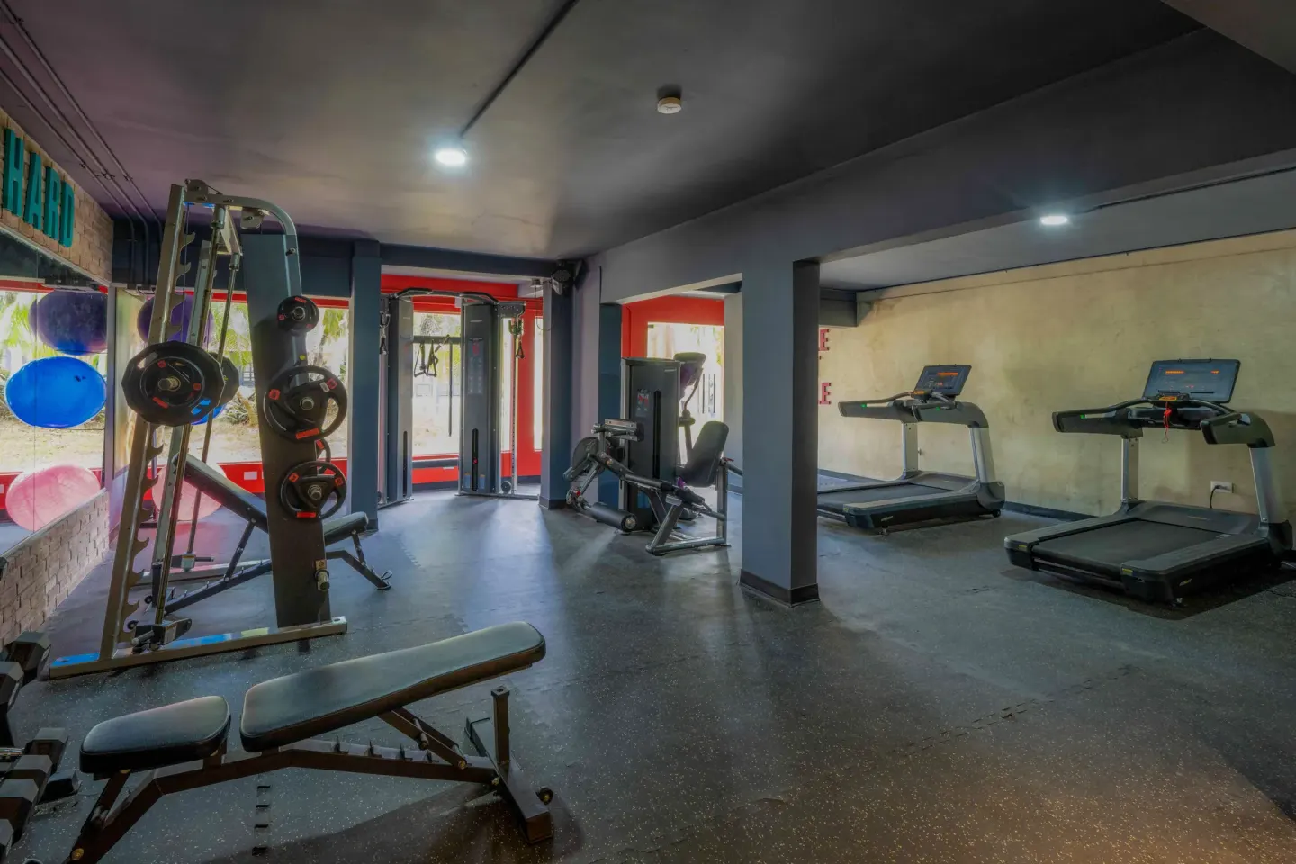 Fitness room with treadmills and weight equipment at Coral Costa Caribe Beach Resort.