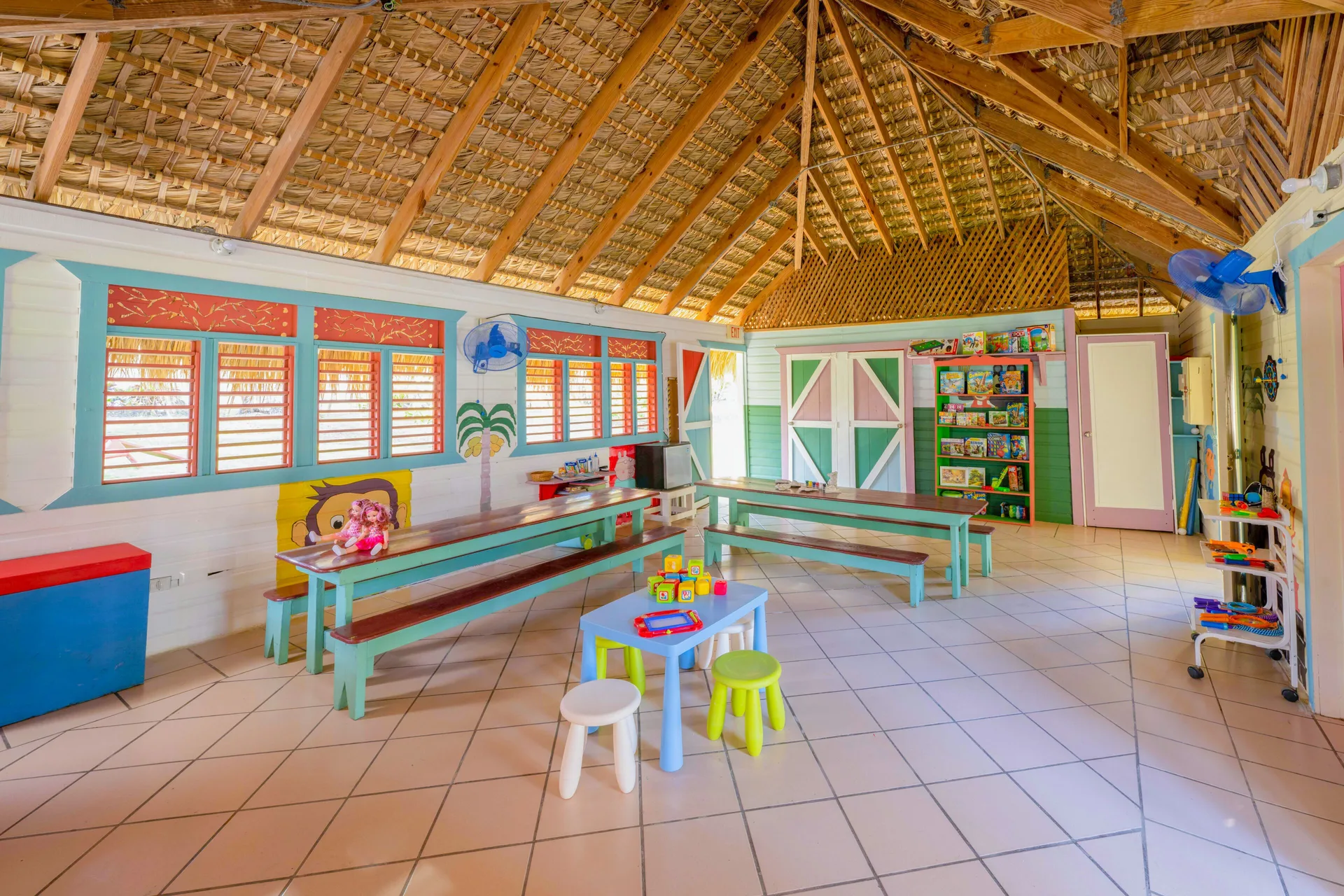 Colorful kids club playroom with toys at Coral Costa Caribe Beach Resort.