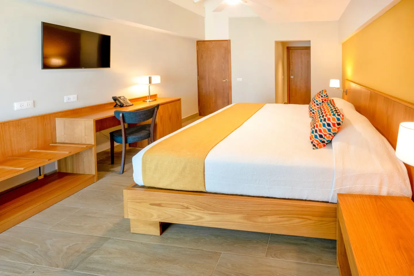 Standard Room Garden View with king bed at Coral Costa Caribe Beach Resort.