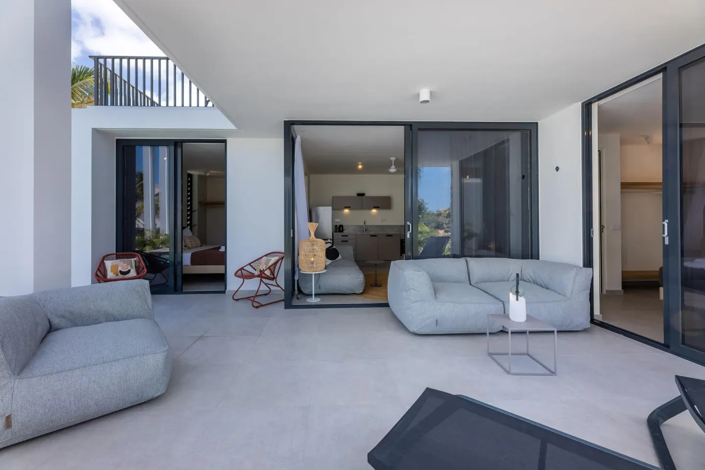 Premium Villa covered terrace with sofas and open interiors at Coral Estate Luxury Resort.