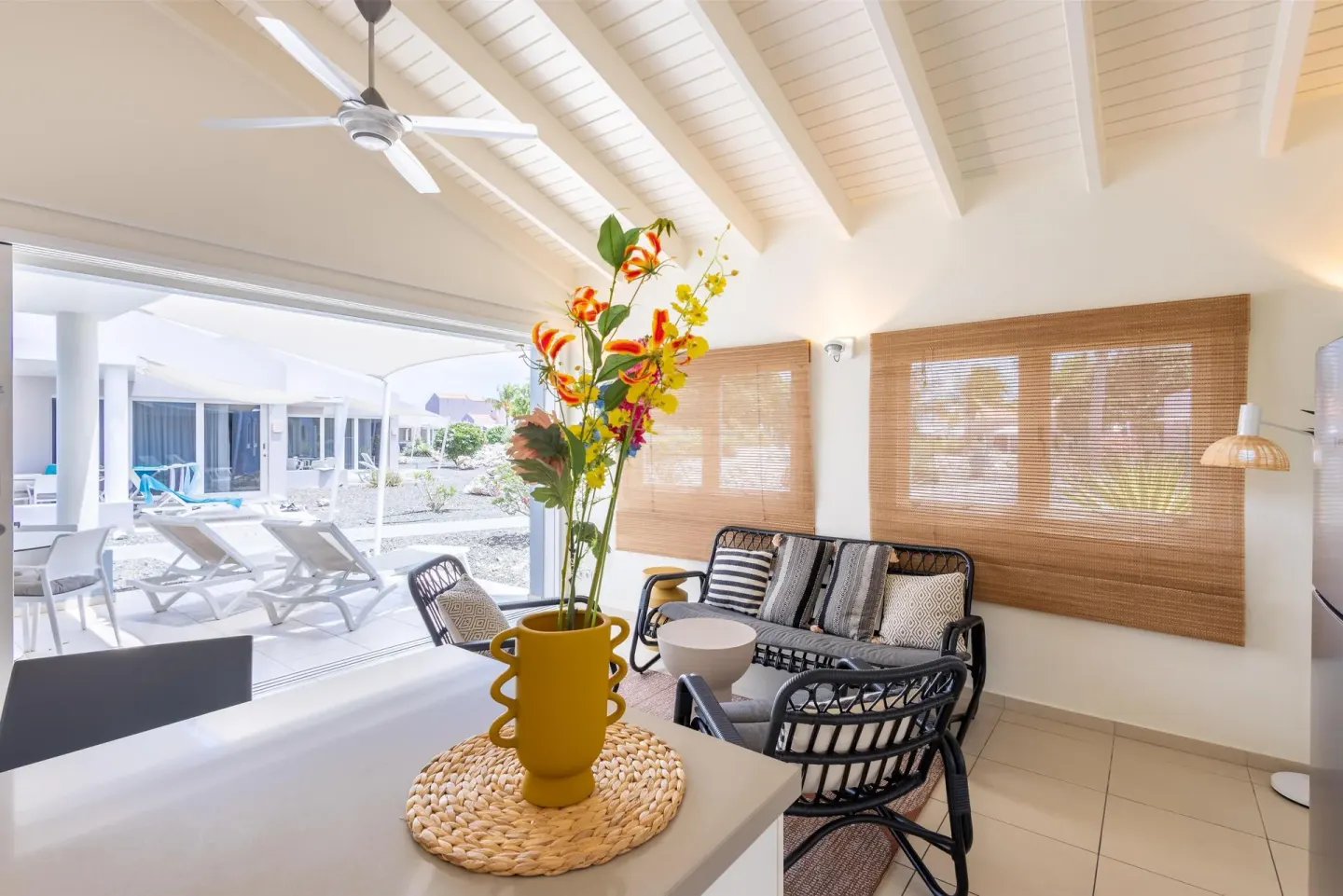 Bright apartment lounge opening to terrace at Coral Estate Luxury Resort.