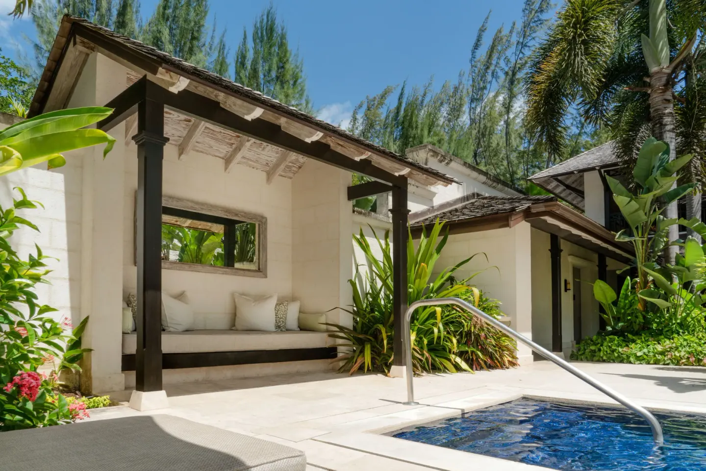 Private plunge pool and shaded terrace seating at Coral Reef Club.