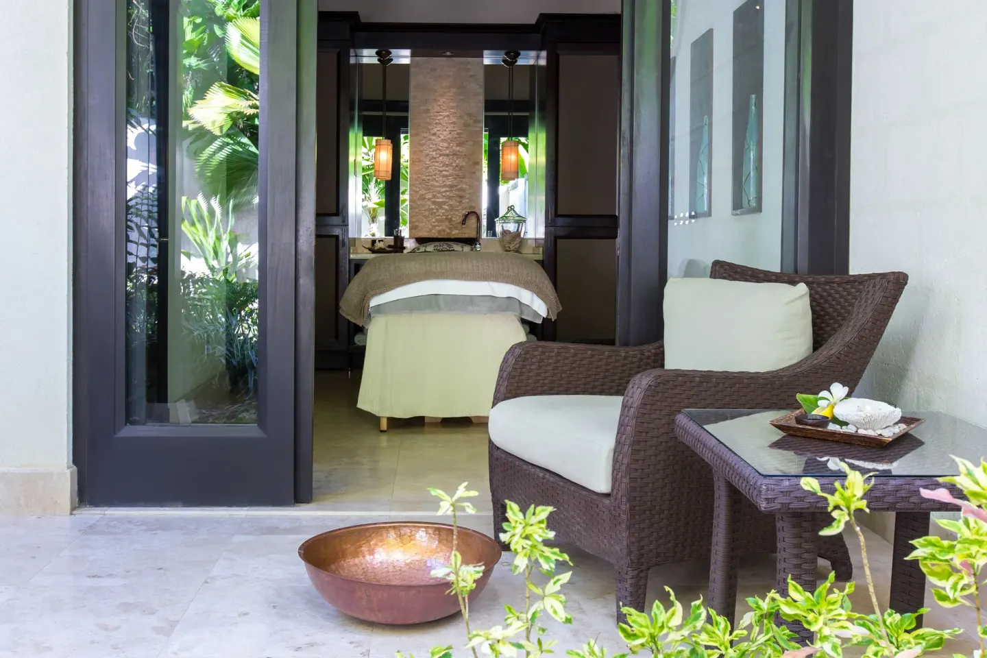 Spa treatment room and terrace chair at Coral Reef Club.